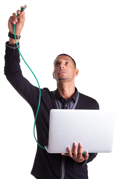 Young african american computer scientist plugin a ethernet cabl — Stock Photo, Image