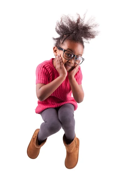 Portrait of Young African American girl jumping — Stock Photo, Image