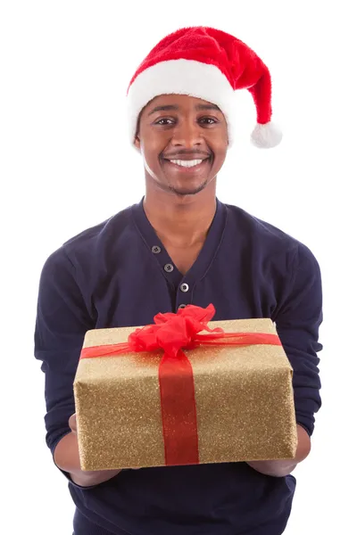 Young African American man offering a gift — Stock Photo, Image