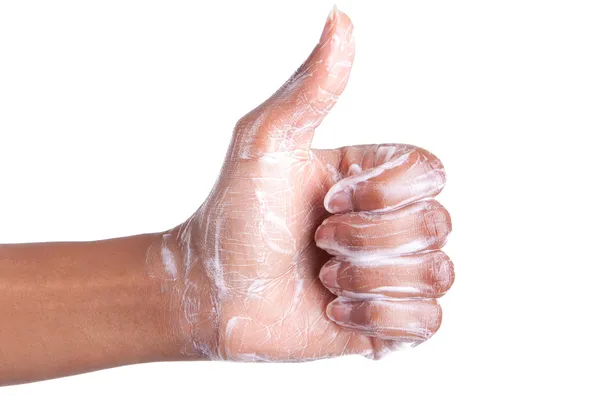 Soapy African American womens hand making thumbs up — Stock Photo, Image