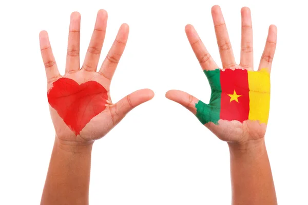 African hands with a painted heart and cameroon flag, i love cam — Stock Photo, Image