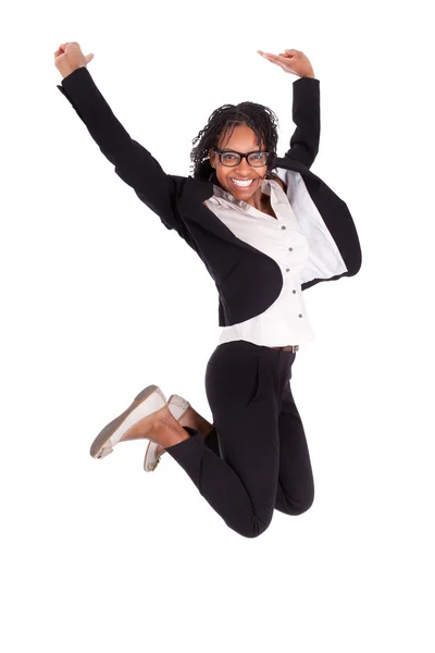 Jovem mulher de negócios afro-americana saltando, conceito de sucesso — Fotografia de Stock