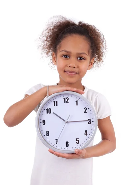 Piccolo africano asiatico ragazza holding un orologio — Foto Stock