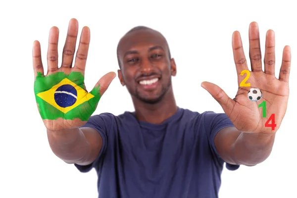 Manos de hombre brasileño con un corazón pintado y bandera brasileña, i — Foto de Stock
