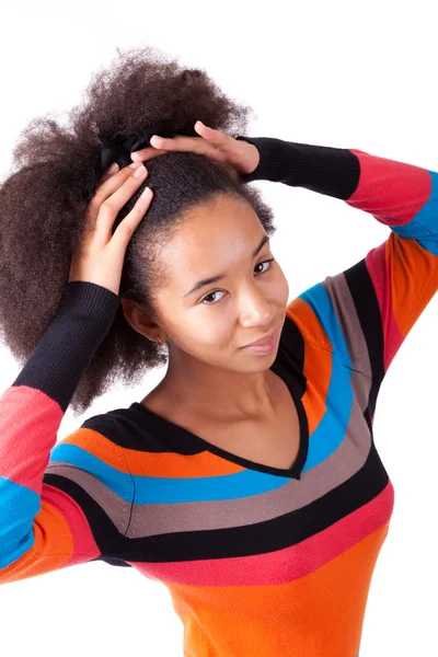 Black African American teenage girl holding her afro hair — Stock Photo, Image