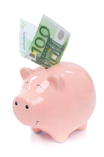 Smiling Piggy bank with euro bills — Stock Photo, Image