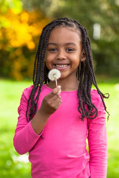 Outdoor portrait of a cute young black girl - African — Stock Photo, Image