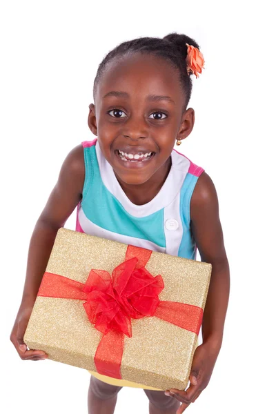 Young African American little girl holding a gift box — Stock Photo, Image