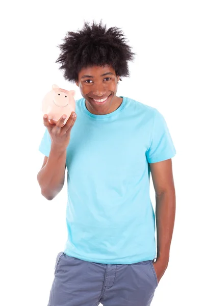 Junge schwarze Teenager halten ein Sparschwein - afrikanisch — Stockfoto