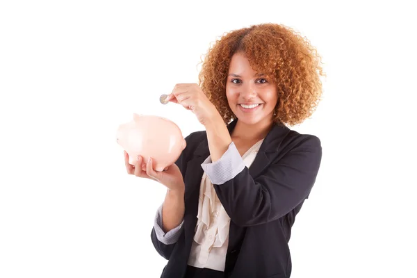Young african american business woman holding a piggy bank - Afr — Stock Photo, Image