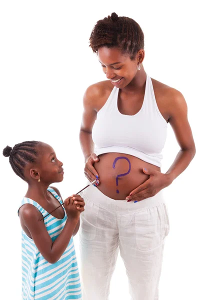 Little african american girl painting on her mother's belly - Af — Stock Photo, Image