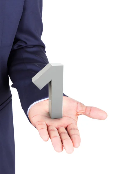 Business man holding a 3d number in hand palm — Stock Photo, Image