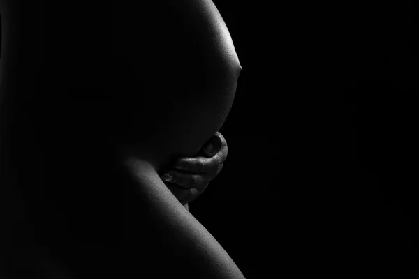 Pregnant African American woman body silhouette - Black people Stock Image