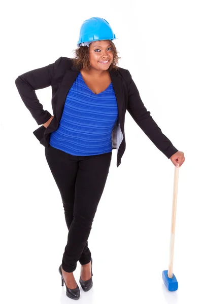 African American woman holding a demolition hammer - Black peop — Stock Photo, Image