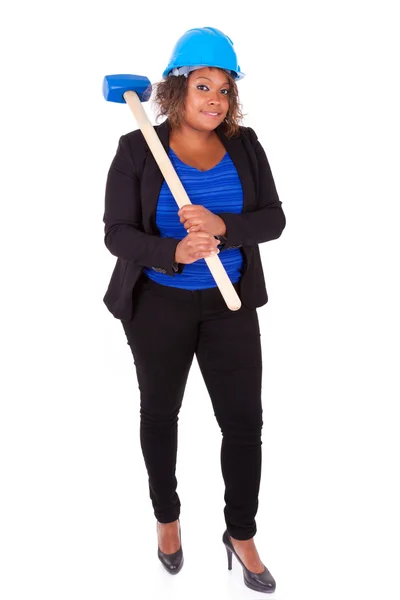 African american vrouw houden een sloop hamer - zwarte pers — Stockfoto