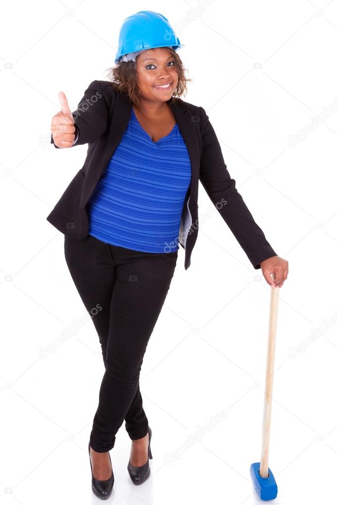 African American woman holding a demolition hammer - Black peop