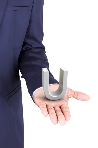 Business man holding a 3d letter in hand palm — Stock Photo, Image