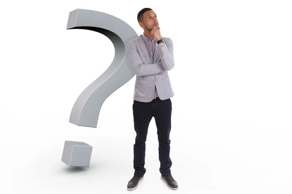 Young thoughtful african american man surrounded by question ma — Stock Photo, Image