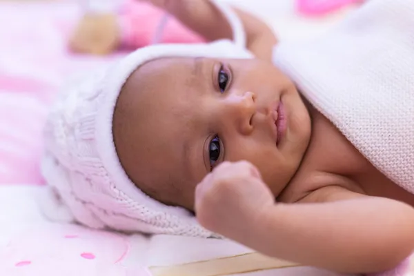 Adorable little African american baby girl looking - Black peopl — стоковое фото