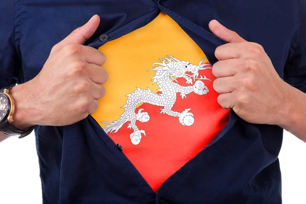 Young sport fan opening his shirt and showing the flag his count — Stock Photo, Image