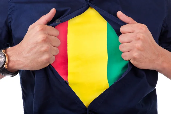 Jovem fã do esporte abrindo sua camisa e mostrando a bandeira sua contagem — Fotografia de Stock