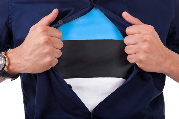 Юный фанат спорта расстегивает рубашку и показывает флаг своему графу — стоковое фото