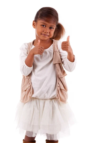 Cute little African Asian girl making  thumbs up gesture  isolat — Stock Photo, Image