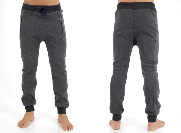 Hommes en pantalon de sport — Photo