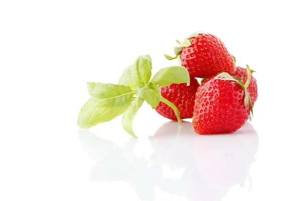 Strawberries with basil — Stock Photo, Image