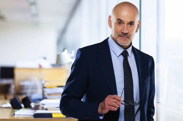 Thinking Businessman Wearing Suit Tie While Standing Office — Stock Photo, Image