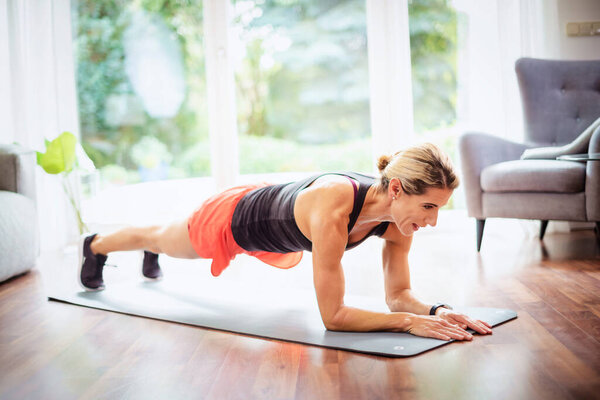 Shot Woman Doing Body Workout Home Sporty Female Planking Yoga Stock Photo