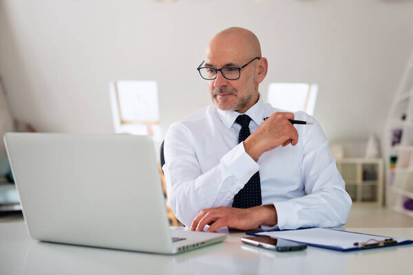 Confident Businessman Sitting Office Working Laptop Royalty Free Stock Photos