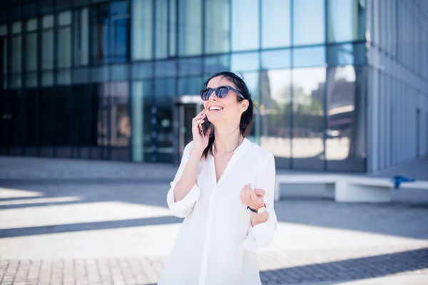 Mid Adult Woman Using Smartphone Walking Outdoors City Happy Female — стоковое фото