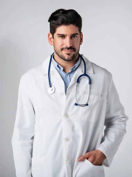 Studio Portrait Male Doctor Standing Isolated White Background Copy Space — Stockfoto