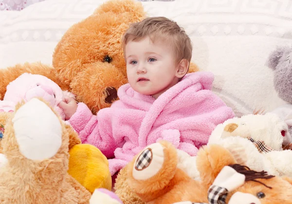 Menina com brinquedos — Fotografia de Stock