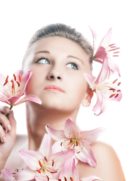 Girl with lilies Royalty Free Stock Images