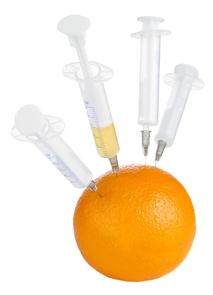 オレンジ色の注射器 — ストック写真