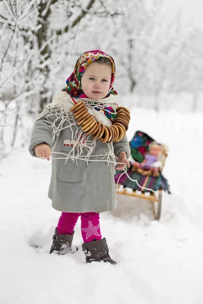 Girl and sled — Stock Photo, Image