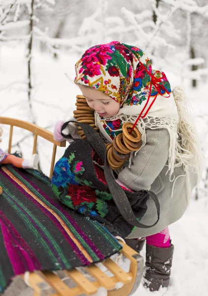 Girl and sled — Stock Photo, Image