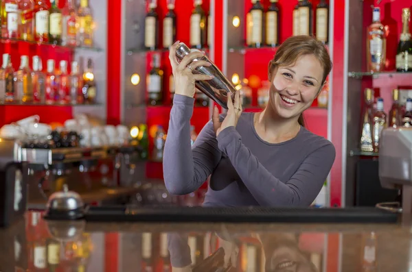 Bartender girl behind the counter — Stock Photo, Image
