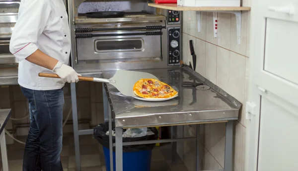 Pizza with blades — Stock Photo, Image