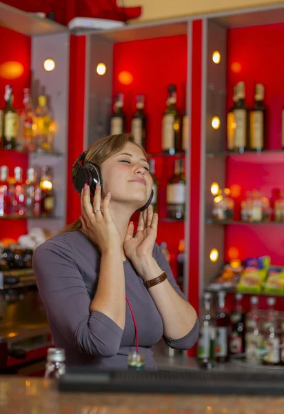 Girl with headphones — Stock Photo, Image