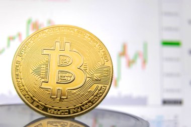 Grafiğin arka planında bitcoin