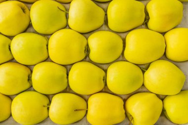 boxed yellow apples close-up