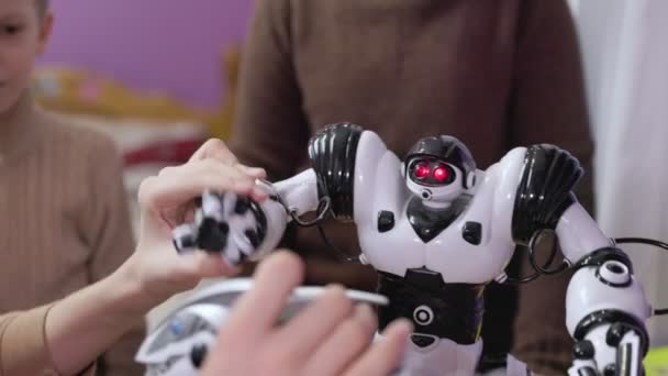 Children playing with toy robots — 비디오