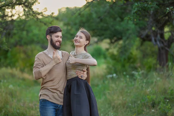 couple showing a gesture that everything is fine