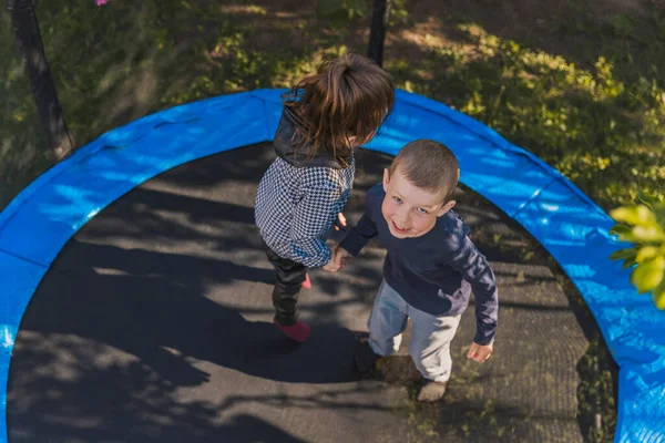 Top View Small Children Jumping Trampoline — Stock Photo, Image