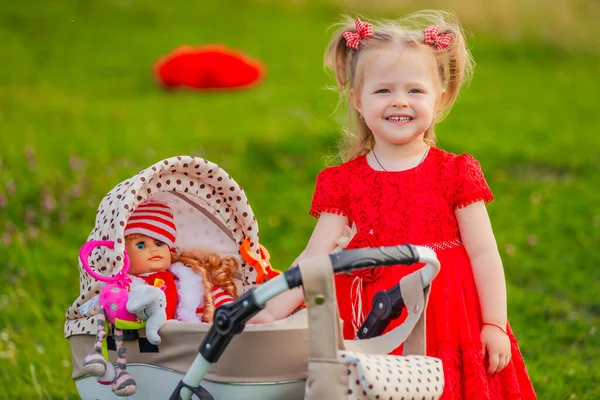Girl Playing Doll Stroller Nature — Stock Photo, Image