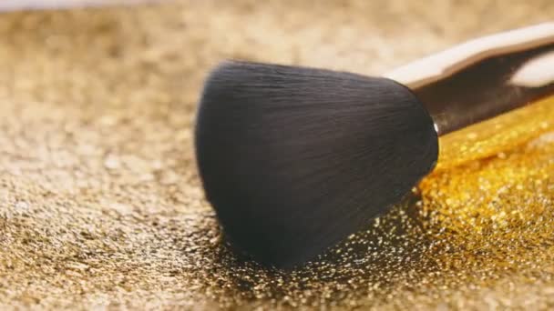 Makeup Brush Shot Close Golden Surface — Video