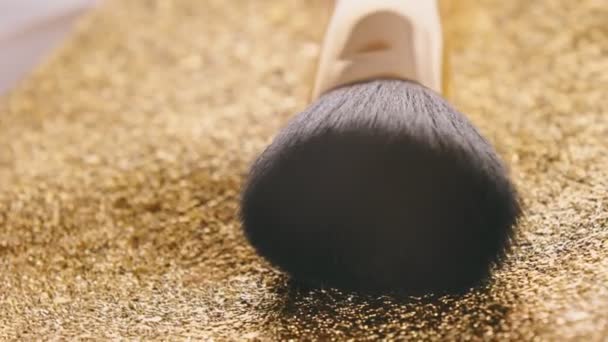 Makeup Brush Shot Close Golden Surface — Wideo stockowe